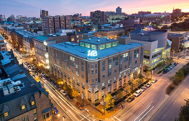 An aerial shot of the University of Baltimore campus at night.